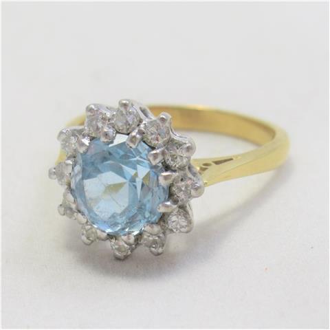 Blue topaz & Diamond Cluster Ring